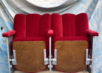 A pair of art deco scallop back cinema seats